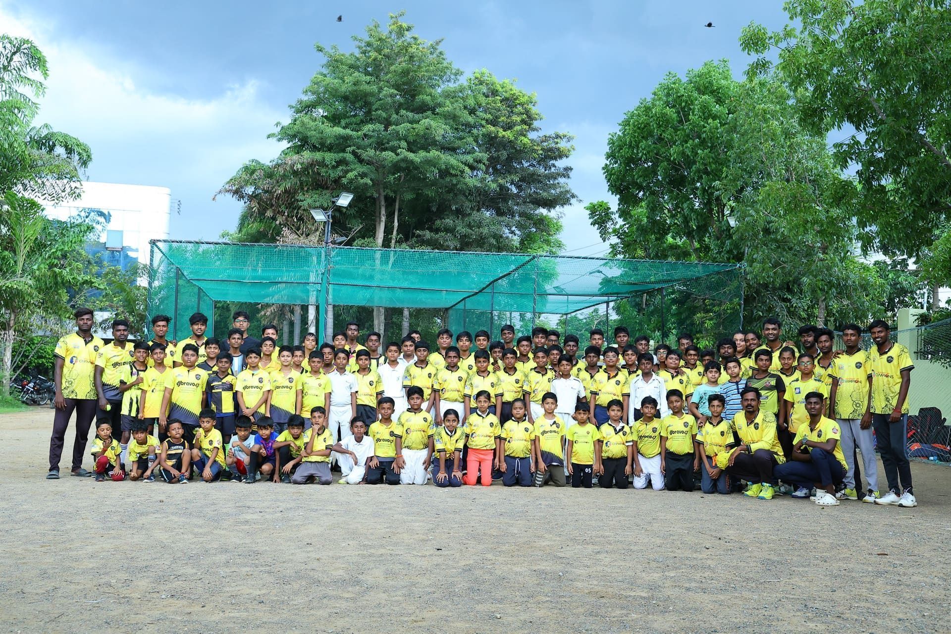 DJ Bravo 47 academy juniors team photo at the nets